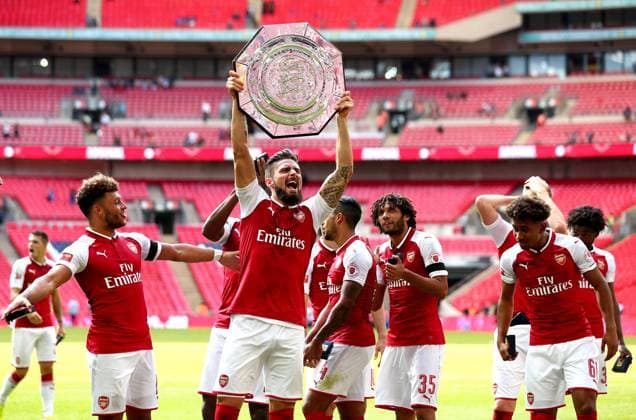 Mandatory Credit: Photo by Robbie Stephenson Jmp Shutterstock (8984415y) Olivier Giroud of Arsenal celebrates with the Community Shield Arsenal v Chelsea, UK - 06 Aug 2017 EDITORIAL USE ONLY No use with unauthorised audio, video, data, fixture lists (outside the EU), club league logos or live services. Online in-match use limited to 45 images (+15 in extra time). No use to emulate moving images. No use in betting, games or single club league player publications services. Arsenal v Chelsea, UK - 06 Aug 2017 EDITORIAL USE ONLY No use with unauthorised audio, video, data, fixture lists (outside the EU), club league logos or live services. Online in-match use limited to 45 images (+15 in extra time). No use to emulate moving images. No use in betting, games or  Copyright: xRobbiexStephenson Jmp Shutterstockx 8984415y