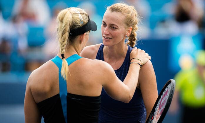 August 20, 2021, CINCINNATI, UNITED STATES: Petra Kvitova of the Czech Republic & Angelique Kerber of Germany hug after Kvitova is forced to retire from the quarter-final at the 2021 Western & Southern Open WTA, Tennis Damen 1000 tennis tournament CINCINNATI UNITED STATES - ZUMAa181 20210820_zaa_a181_093 Copyright: xRobxPrangex