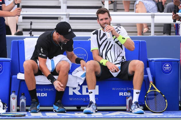 CINCINNATI, OH - AUGUST 20: Austin Krajicek of the United States (right) sits alongside Steve Johnson of the United States during a stop in play at the Western & Southern Open at the Lindner Family Tennis Center on August 20, 2021 in Mason, Ohio. (Photo by Ian Johnson Icon Sportswire) TENNIS: AUG 20 Western & Southern Open Icon210820032