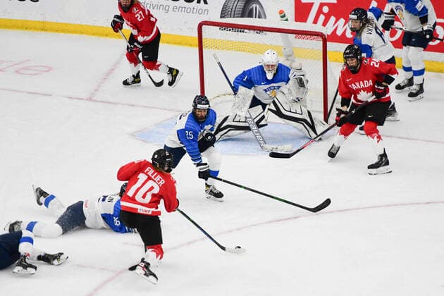 August 20, 2021, Calgary, AB, Canada: Canada s SARAH FILLIER (bottom) prepares to make a shot on net during the Finland vs Canada preliminary round game at the 2021 IIHF Women s World Championship, WM, Weltmeisterschaft in Calgary, AB, Canada on Aug 20, 2021. Canada defeated Finland 5-3. The 12-day tournament returns after more than two year due to the COVID-19 pandemic. Calgary Canada - ZUMAj113 20210820_zip_j113_094 Copyright: xGavinxJohnx