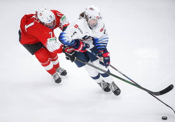 August 20, 2021, Calgary, ab, Canada: Megan Keller, right, of the United States, tries to get past Switzerland s Lena Marie Lutz during third period IIHF Women s World Championship, WM, Weltmeisterschaft hockey action in Calgary, Friday, Aug. 20, 2021. Lena Marie Lutz, Megan Keller, - ZUMAc35_ 20210820_zaf_c35_093 Copyright: xJeffxMcintoshx