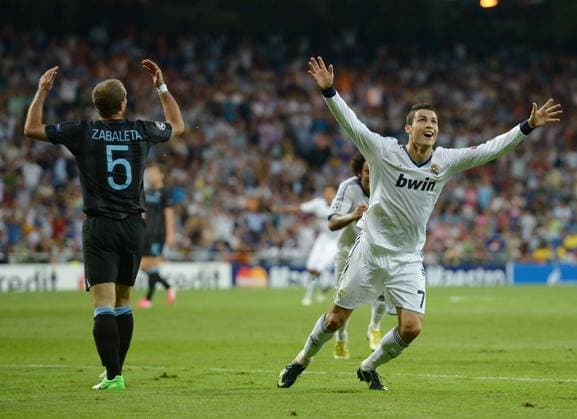 Mandatory Credit: Photo by Back Page Images Shutterstock (1865935f) Cristiano Ronaldo of Real Madrid celebrates scoring the winning goal in front of a dejected Pablo Zabaleta of Manchester City Real Madrid v Manchester City, UEFA Champions League football match, Santiago Bernabeu Stadium, Madrid, Spain - 18 Sep 2012 Real Madrid defeated Manchester City 3-2 EDITORIAL USE ONLY Real Madrid v Manchester City, UEFA Champions League football match, Santiago Bernabeu Stadium, Madrid, Spain - 18 Sep 2012 EDITORIAL USE ONLY  Copyright: xBackxPagexImages Shutterstockx 1865935f