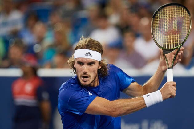 CINCINNATI, OH - AUGUST 20: Stefanos Tsitsipas of Greece focuses on hitting a forehand slice during the quarter final match on day 5 of the Western & Southern Open at the Lindner Family Tennis Center in Mason, Ohio on August 20, 2021. (Photo by Shelley Lipton Icon Sportswire) TENNIS: AUG 20 Western & Southern Open Icon2108201059