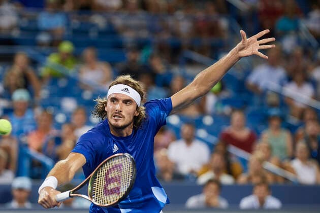 CINCINNATI, OH - AUGUST 20: Stefanos Tsitsipas of Greece stretches to hit a forehand slice during the quarter final match on day 5 of the Western & Southern Open at the Lindner Family Tennis Center in Mason, Ohio on August 20, 2021. (Photo by Shelley Lipton Icon Sportswire) TENNIS: AUG 20 Western & Southern Open Icon2108201061