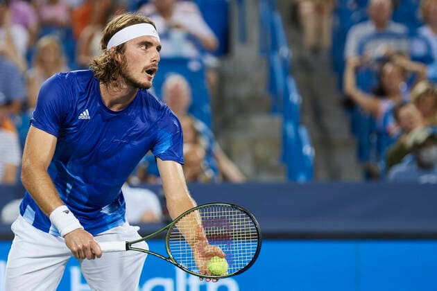 CINCINNATI, OH - AUGUST 20: Stefanos Tsitsipas of Greece focuses before hitting a serve during the quarter final match on day 5 of the Western & Southern Open at the Lindner Family Tennis Center in Mason, Ohio on August 20, 2021. (Photo by Shelley Lipton Icon Sportswire) TENNIS: AUG 20 Western & Southern Open Icon2108201091