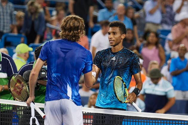 CINCINNATI, OH - AUGUST 20: Stefanos Tsitsipas of Greece shakes hands after winning the quarterfinal match against Felix Auger-Aliassime of Canada on day 5 of the Western & Southern Open at the Lindner Family Tennis Center in Mason, Ohio on August 20, 2021. (Photo by Shelley Lipton Icon Sportswire) TENNIS: AUG 20 Western & Southern Open Icon2108201096