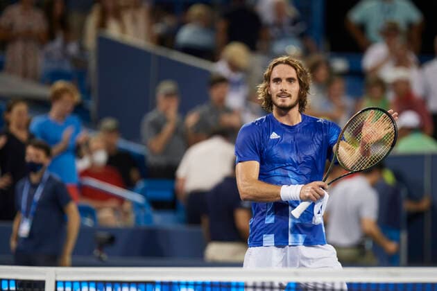 CINCINNATI, OH - AUGUST 20: Stefanos Tsitsipas of Greece smiles at the crowd after winning the quarterfinal match against Felix Auger-Aliassime of Canada on day 5 of the Western & Southern Open at the Lindner Family Tennis Center in Mason, Ohio on August 20, 2021. (Photo by Shelley Lipton Icon Sportswire) TENNIS: AUG 20 Western & Southern Open Icon2108201111
