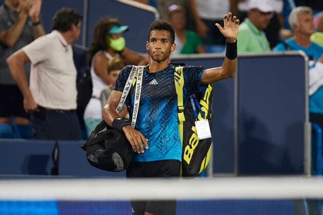 CINCINNATI, OH - AUGUST 20: Felix Auger-Aliassime of Canada waves to the crowd after losing his quarterfinal match against Stefanos Tsitsipas of Greece on day 5 of the Western & Southern Open at the Lindner Family Tennis Center in Mason, Ohio on August 20, 2021. (Photo by Shelley Lipton Icon Sportswire) TENNIS: AUG 20 Western & Southern Open Icon2108201148
