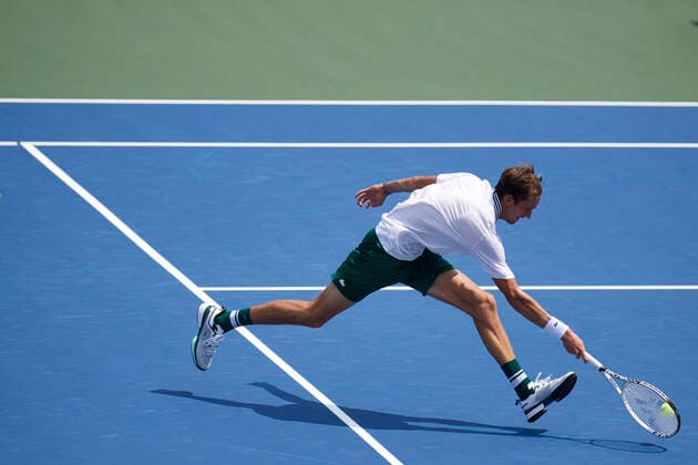 CINCINNATI, OH - AUGUST 21: Daniil Medvedev of Russia stretches to return a short ball during the semifinal match on day 7 of the Western & Southern Open at the Lindner Family Tennis Center in Mason, Ohio on August 21, 2021. (Photo by Shelley Lipton Icon Sportswire) TENNIS: AUG 21 Western & Southern Open Icon210821374