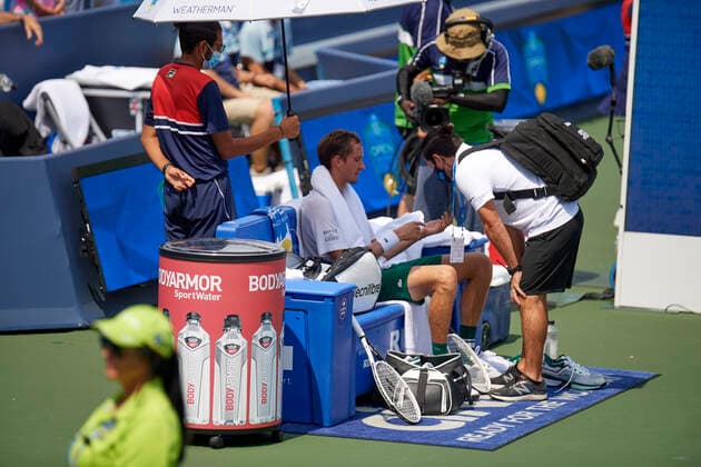 CINCINNATI, OH - AUGUST 21: Daniil Medvedev of Russia takes a medical timeout during the semifinal match on day 7 of the Western & Southern Open at the Lindner Family Tennis Center in Mason, Ohio on August 21, 2021. (Photo by Shelley Lipton Icon Sportswire) TENNIS: AUG 21 Western & Southern Open Icon210821500
