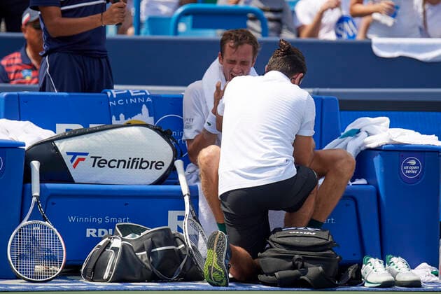 CINCINNATI, OH - AUGUST 21: Daniil Medvedev of Russia takes a medical timeout during the semifinal match on day 7 of the Western & Southern Open at the Lindner Family Tennis Center in Mason, Ohio on August 21, 2021. (Photo by Shelley Lipton Icon Sportswire) TENNIS: AUG 21 Western & Southern Open Icon210821505
