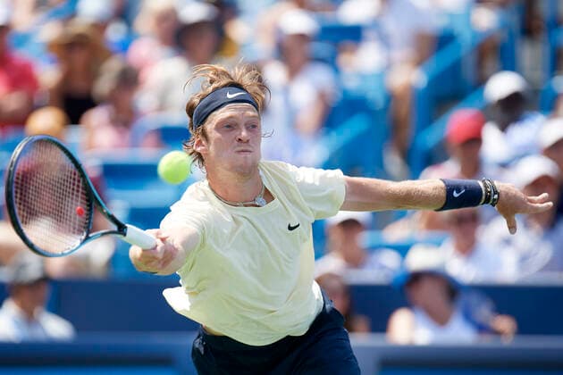 CINCINNATI, OH - AUGUST 21: Andrey Rublev of Russia stretches to hit a forehand shot during the semifinal match on day 7 of the Western & Southern Open at the Lindner Family Tennis Center in Mason, Ohio on August 21, 2021. (Photo by Shelley Lipton Icon Sportswire) TENNIS: AUG 21 Western & Southern Open Icon210821698