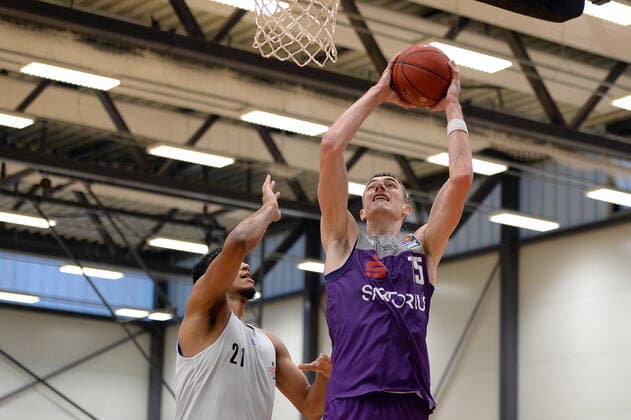 BG Göttingen Medipolis SC Jena 23 08 2021, Basketball Bundesliga, 2021 2022 season, preparation, BG Göttingen Medipolis SC Jena Göttingens Philipp Hartwich r plays against Jenas Rafael Alberton Rodrigues Göttingen Lower Saxony Germany.