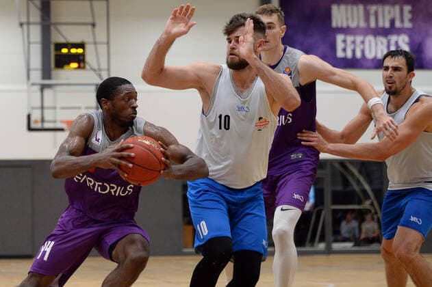 BG Göttingen Medipolis SC Jena 23 08 2021, Basketball Bundesliga, 2021 2022 season, preparation, BG Göttingen Medipolis SC Jena Göttingens Kamar Baldwin l plays against Jenas Julius Wolf Göttingen Lower Saxony Germany.