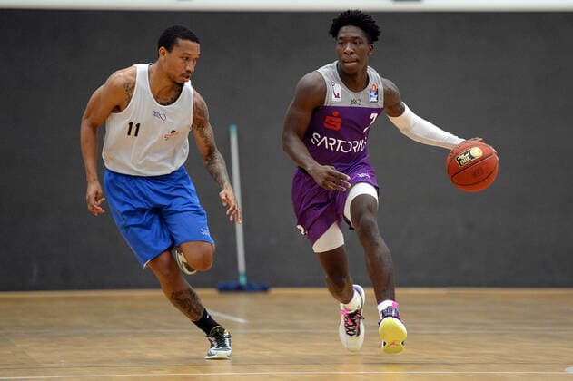 BG Göttingen Medipolis SC Jena 23 08 2021, Basketball Bundesliga, 2021 2022 season, preparation, BG Göttingen Medipolis SC Jena Göttingens Zack Bryant r plays Jenas Rayshawn Simmons Göttingen Lower Saxony Germany.