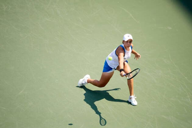 CINCINNATI, OH - AUGUST 22: Ashleigh Barty of Australia stretches to hit a backhand shot during the womenÕs championship match of the Western & Southern Open at the Lindner Family Tennis Center in Mason, Ohio on August 22, 2021. (Photo by Shelley Lipton Icon Sportswire) TENNIS: AUG 22 Western & Southern Open Icon210822100