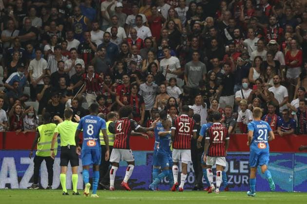 Nice, France, 22nd August 2021. Dimitri Payet of Olympique De Marseille throws an object back into the crown that was intially thrown in his direction during the Lique 1 match at Allianz Riviera Stadium, Nice. Picture credit should read: Jonathan Moscrop Sportimage EDITORIAL USE ONLY. No use with unauthorised audio, video, data, fixture lists, club league logos or live services. Online in-match use limited to 120 images, no video emulation. No use in betting, games or single club league player publications. SPI-1148-0021