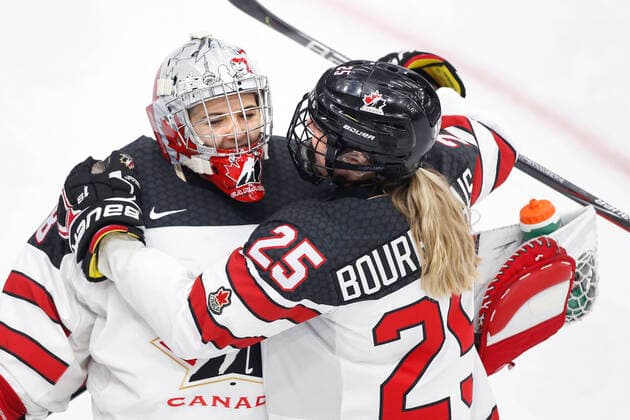 Canada goalie Emerance Maschmeyer, lt, is congratulated by Jaime Bourbonnais, rt, after a 5-0 shutout victory over Switzerland during IIHF Women s World Championship, WM, Weltmeisterschaft play in Calgary, Alberta, Canada on Aug. 24, 2021. digital photo by Larry MacDougal Emerance Maschmeyer, Jaime Bourbonnais