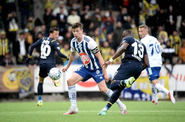 Enner Valencia (13) of Fenerbahce makes their first goal during the football UEFA Europa League play-off match between HJK and Fenerbahce in Helsinki, Finland on August 26, 2021. Daniel O Shaughnessy of HJK on the left. Helsinki Finland LKFTVX20210826191338ECFI  Copyright: xMikkoxStigx