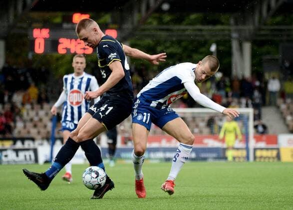 Attila Szalai (L) of Fenerbahce and Roope Riski of HJK during the football UEFA Europa League play-off match between HJK and Fenerbahce in Helsinki, Finland on August 26, 2021. Helsinki Finland LKFTVX20210826192716WIEO  Copyright: xMikkoxStigx