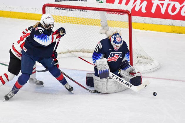 August 26, 2021, Calgary, AB, Canada: ALEX CAVALLINI (right) from The United States makes a save during the Canada vs United States preliminary round game at the 2021 IIHF Women s World Championship, WM, Weltmeisterschaft in Calgary, AB, Canada on 26 August, 2021. Canada defeated the United States 5-1 to take first place in the preliminary round. The last time Canada beat the United States at the World Championship was in 2013. Calgary Canada - ZUMAj113 0131780244st Copyright: xGavinxJohnx