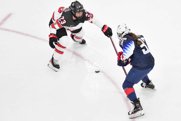 August 26, 2021, Calgary, AB, Canada: Canada s ERIN AMBROSE (left) and MURPHY ABBEY (right) from The United States battle for the puck during the Canada vs United States preliminary round game at the 2021 IIHF Women s World Championship, WM, Weltmeisterschaft in Calgary, AB, Canada on 26 August, 2021. Canada defeated the United States 5-1 to take first place in the preliminary round. The last time Canada beat the United States at the World Championship was in 2013. Calgary Canada - ZUMAj113 0131780245st Copyright: xGavinxJohnx