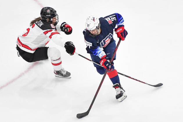 August 26, 2021, Calgary, AB, Canada: Canada s REBECCA JOHNSTON (left) and AERIN FRANKEL (right) from The United States battle for the puck during the Canada vs United States preliminary round game at the 2021 IIHF Women s World Championship, WM, Weltmeisterschaft in Calgary, AB, Canada on 26 August, 2021. Canada defeated the United States 5-1 to take first place in the preliminary round. The last time Canada beat the United States at the World Championship was in 2013. Calgary Canada - ZUMAj113 0131780374st Copyright: xGavinxJohnx