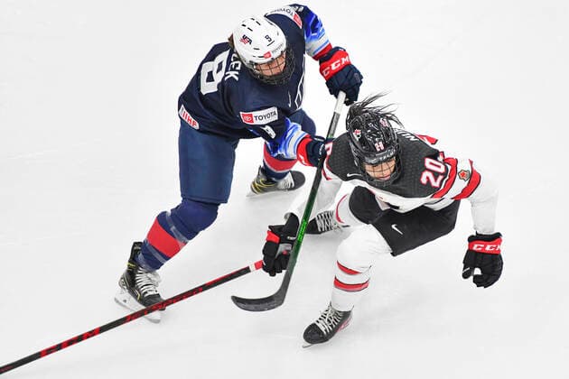 August 26, 2021, Calgary, AB, Canada: Canada s SARAH NURSE (right) and MEGAN BOZEK (left) from The United States battle for the puck during the Canada vs United States preliminary round game at the 2021 IIHF Women s World Championship, WM, Weltmeisterschaft in Calgary, AB, Canada on 26 August, 2021. Canada defeated the United States 5-1 to take first place in the preliminary round. The last time Canada beat the United States at the World Championship was in 2013. Calgary Canada - ZUMAj113 0131780625st Copyright: xGavinxJohnx
