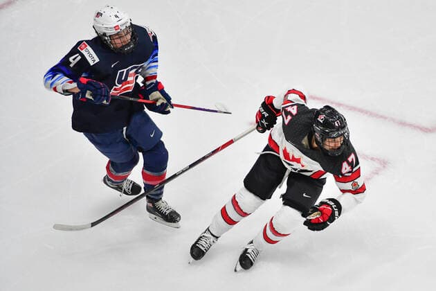 August 26, 2021, Calgary, AB, Canada: CAROLINE HARVEY (left) from The United States and Canada s JAMIE RATTRAY (right) skate up the ice during the Canada vs United States preliminary round game at the 2021 IIHF Women s World Championship, WM, Weltmeisterschaft in Calgary, AB, Canada on 26 August, 2021. Canada defeated the United States 5-1 to take first place in the preliminary round. The last time Canada beat the United States at the World Championship was in 2013. Calgary Canada - ZUMAj113 0131780806st Copyright: xGavinxJohnx