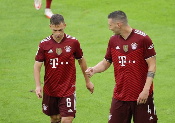 Bundesliga 3 Matchday FC Bayern Munich Hertha BSC Niklas Süle and Joshua Kimmich discuss Munich Bayern Allianz Arena