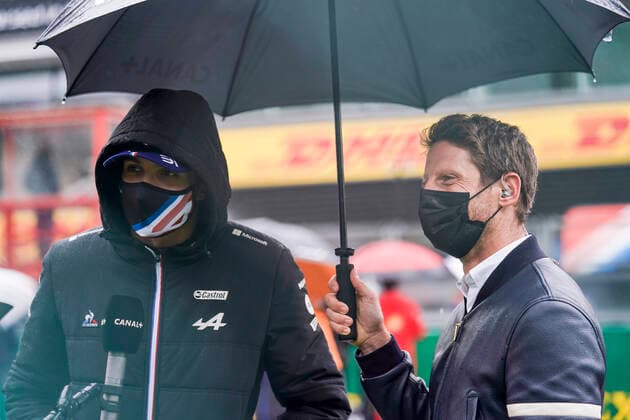 August 29, 2021, Francorchamps, Belgium: ESTEBAN OCON of France and Alpine F1 Team and ROMAIN GROSJEAN, former F1 Driver are seen on the starting grid ahead of the 2021 FIA Formula 1 Belgian Grand Prix at Circuit de Spa-Francorchamps in Francorchamps, Belgium. Francorchamps Belgium - ZUMAg147 20210829_zap_g147_015 Copyright: xJamesxGasperottix