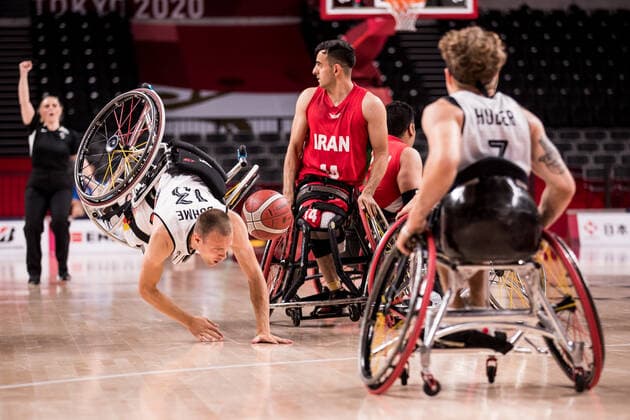 Tokyo 2020 Paralympic Games Wheelchair Basketball , 30 08 2021 TOKYO, JAPAN 30 August Wheelchair Basketball, Germany Iran Men, on Day 6 of the Tokyo 2020 Paralympic Games at Ariake Arena on 30 08 2021 in Tokyo Japan Thomas Boehme 13, Germany flies after foul by Mojtaba Kamali 14, Iran Copyright: xBEAUTIFULxSPORTS Wunderlx