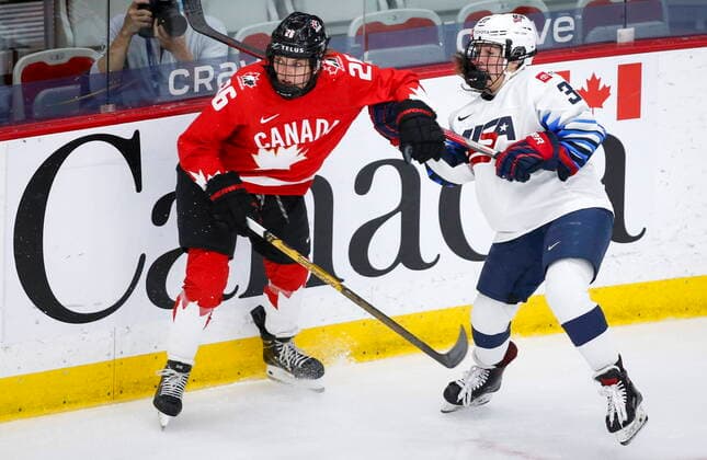 August 31, 2021, Calgary, ab, Canada: Canada s Emily Clark, left, checks Abbey Murphy, of the United States, during first period gold medal final IIHF Women s World Championship, WM, Weltmeisterschaft hockey action in Calgary, Tuesday, Aug. 31, 2021. Emily Clark, Abbey Murphy, - ZUMAc35_ 20210831_zaf_c35_073 Copyright: xJeffxMcintoshx