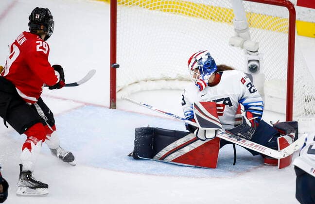 August 31, 2021, Calgary, ab, Canada: Canada s Marie-Philip Poulin, left, hits the post as goalie Nicole Hensley, of the United States, looks back during third period gold medal final IIHF Women s World Championship, WM, Weltmeisterschaft hockey action in Calgary, Tuesday, Aug. 31, 2021. Marie-Philip Poulin, Nicole Hensley, - ZUMAc35_ 20210831_zaf_c35_088 Copyright: xJeffxMcintoshx