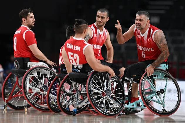 6639152 01.09.2021 Turkey s athletes gather during the men s wheelchair basketball quarterfinal match between Turkey and the United States at the Tokyo 2020 Paralympic Games at Ariake Arena in Tokyo, Japan. Pavel Bednyakov Sputnik Japan Paralympics 2020 Wheelchair Basketball Men Turkey - USA  61f15a3f3d484f99