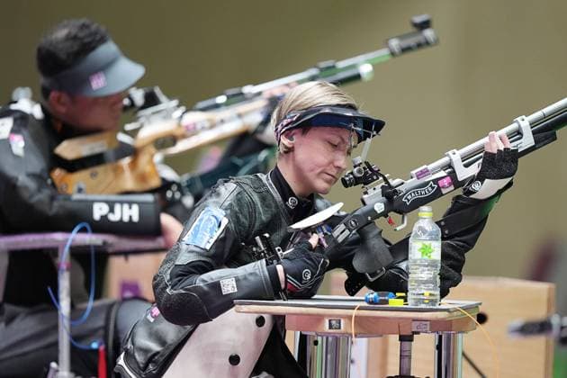 (210901) -- TOKYO, Sept. 1, 2021 -- Natascha Hiltrop (R) of Germany reacts during the mixed 10m Air Rifle Prone R3-SH1 final of shooting event at the Tokyo 2020 Paralympic Games in Tokyo, Japan, Sept. 1, 2021. ) (TOKOY2020)JAPAN-TOKYO-PARALYMPICS-SHOOTING-MIXED 10M AIR RIFLE PRONE R3-SH1-FINAL XiongxQi 