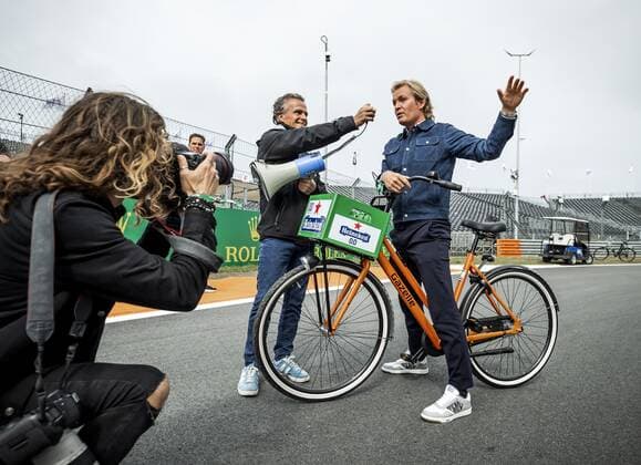 ZANDVOORT Jan Lammers interviews Nico Rosberg on his bike during a press conference For the first time in 36 years, the Formula 1 race Dutch Grand Prix Zandvoort will be held at Circuit Zandvoort REMKO DE WAAL xVIxANPxSportx xxANPxIVx 436625633