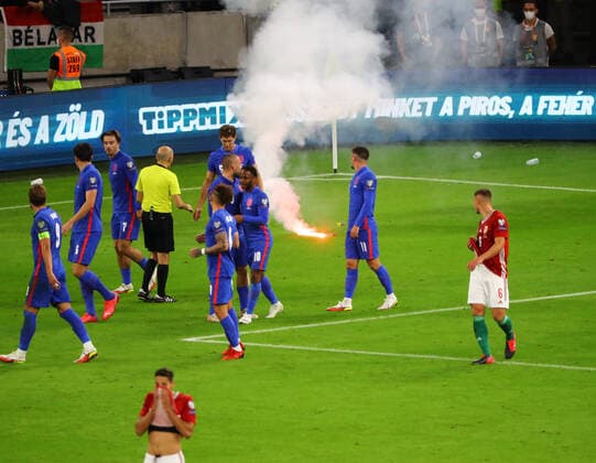 Hungary v England 2022 FIFA World Cup, WM, Weltmeisterschaft, Fussball Qualifiers A flare lands on the pitch as England celebrate their third goal during the 2022 FIFA World Cup Qualifiers match at the Ferenc Puskas Stadium, Budapest Content Not Available For UK Newspapers Copyright: xFocusxImagesx FIL-15839-0045