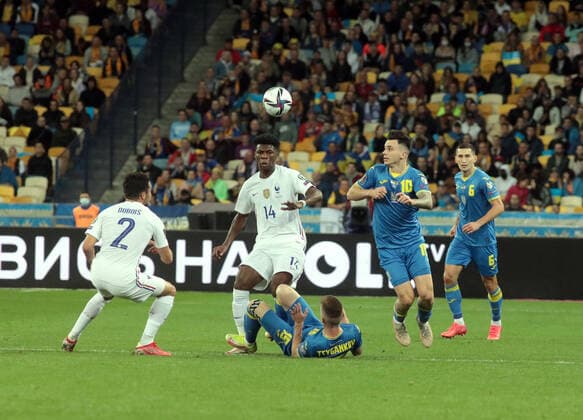 KYIV, UKRAINE - SEPTEMBER 4, 2021 - Midfielders Mykola Shaparenko (R) and Viktor Tsygankov (2nd R) of Ukraine are seen in action with defender Leo Dubois (L) and midfielder Aurelien Tchouameni (2nd L) of France during the FIFA World Cup, WM, Weltmeisterschaft, Fussball Qatar 2022 Qualification Round UEFA Group D match at the NSC Olimpiyskiy, Kyiv, capital of Ukraine. Ukraine vs France in European Qualifiers match in Kyiv  Copyright: xHennadiixMinchenkox