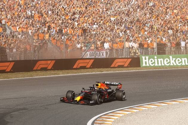 ZANDVOORT Max Verstappen waves to his fans after winning the Dutch Grand Prix at the Zandvoort circuit ANP VINCENT JANNINK Grand Prix xVIxANPxSportx xxANPxIVx 436907582