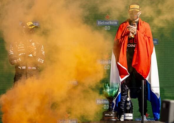 ZANDVOORT Lewis Hamilton Mercedes and Max Verstappen Red Bull on the podium after the Dutch Grand Prix at the Zandvoort circuit REMKO DE WAAL Grand Prix xVIxANPxSportx xxANPxIVx 436910396