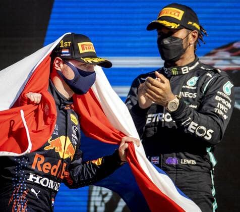 ZANDVOORT Max Verstappen Red Bull Racing celebrates winning the Dutch Grand Prix at the Zandvoort circuit together with Lewis Hamilton Mercedes KOEN VAN WEEL Grand Prix xVIxANPxSportx xxANPxIVx 436911676