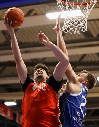 05 09 2021, Basketball, REWE Cup 2021, Final, Fraport Skyliners s Oliver Wuerzburg, GER, Hagen, Krollmann Arena Picture f li Nicolas Carvacho s Oliver Wuerzburg and Lorenz Brenneke Fraport Skyliners DFL REGULATIONS PROHIBIT ANY USE OF PHOTOGRAPHS AS IMAGE SEQUENCES AND OR QUASI VIDEO Copyright: HMBxMedia xHeikoxBecker