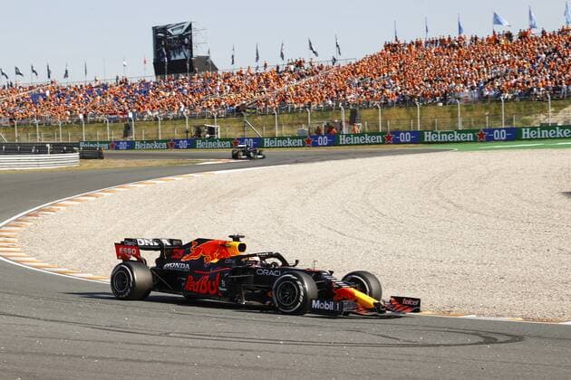 ZANDVOORT Max Verstappen with Lewis Hamilton behind him during the Dutch Grand Prix at the Zandvoort circuit ANP VINCENT JANNINK Grand Prix xVIxANPxSportx xxANPxIVx 436913539