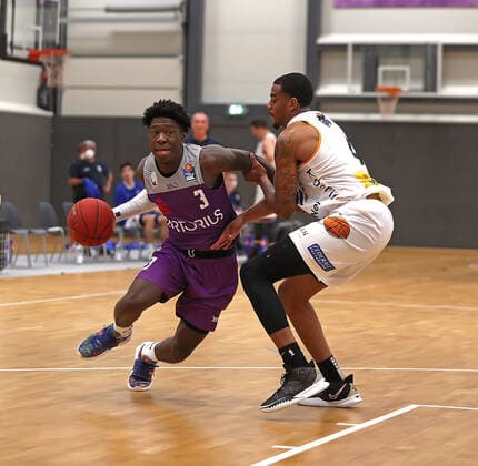 GSD zje123 BBL Easy Ctredit Basketball Season 2021 22 Test Match BG Göttingen Okapi Aalst Göttingens Zack Bryant on the ball against Deontae Hawkins.