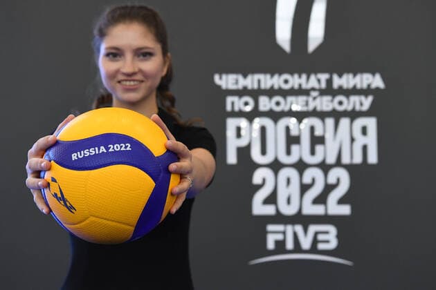 6646026 08.09.2021 A girl poses near a stall of the 2022 FIVB Volleyball Men s World Championship, WM, Weltmeisterschaft during the 9th international forum Russia - Country of Sports , at the Kazan Expo exhibition center in Kazan, Tatarstan, Russia. Maksim Bogodvid Sputnik Russia Sports Forum  73521ed7a6278fe0