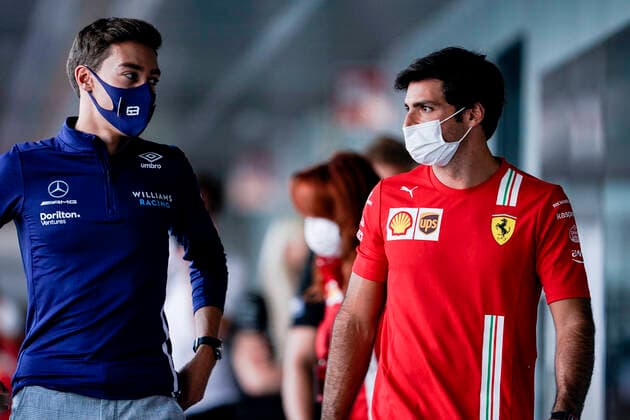 September 9, 2021, Monza, Italy: GEORGE RUSSEL of Great Britain and Williams Racing and CARLOS SAINZ Jr of Spain and Scuderia Ferrari are seen during preparations of the 2021 FIA Formula 1 Italian Grand Prix at Autodromo Nazionale Monza in Monza, Italy. Monza Italy - ZUMAg147 20210909_zap_g147_010 Copyright: xJamesxGasperottix