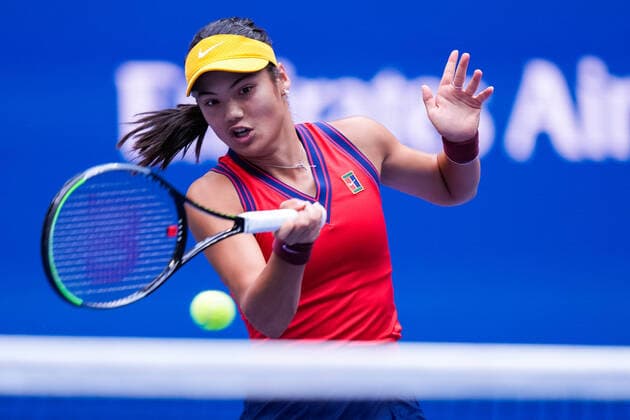 Emma Raducanu of Great Britain returns a ball to Leylah Fernandez of Canada in the Women s Final in Arthur Ashe Stadium at the 2021 US Open Tennis Championships at the USTA Billie Jean King National Tennis Center on Saturday, September 11, 2021 in New York City.  NYP20210911804 COREYxSIPKIN