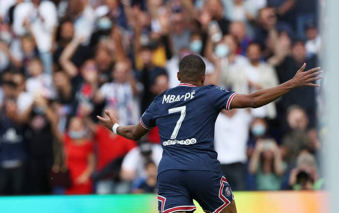 (210912) -- PARIS, Sept. 12, 2021 -- Paris Saint Germain s Kylian Mbappe celebrates scoring during the French Ligue 1 football match between Paris Saint Germain (PSG) and Clermont in Paris, France, Sept. 11, 2021. ) (SP)FRANCE-PARIS-FOOTBALL-LEAGUE 1-PSG VS CLERMONT GaoxJing 
