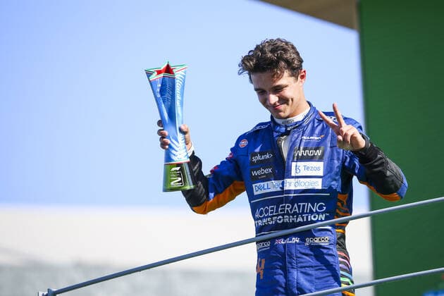 NORRIS Lando (gbr), McLaren MCL35M, portrait, podium during the Formula 1 Heineken Gran Premio D italia 2021, Italian Grand Prix, 14th round of the 2021 FIA Formula One World Championship, WM, Weltmeisterschaft from September 9 to 12, 2021 on the Autodromo Nazionale di Monza, in Monza, Italy FORMULE 1 : Grand prix d Italie - Monza - 12 09 2021 DPPI Panoramic 00121030_JFBE3303.JPG